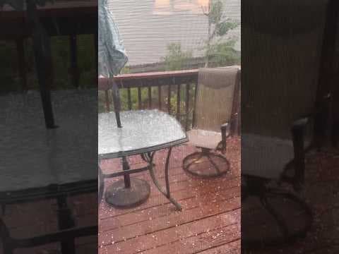 Hail falls during thunderstorm in Aurora, Colorado