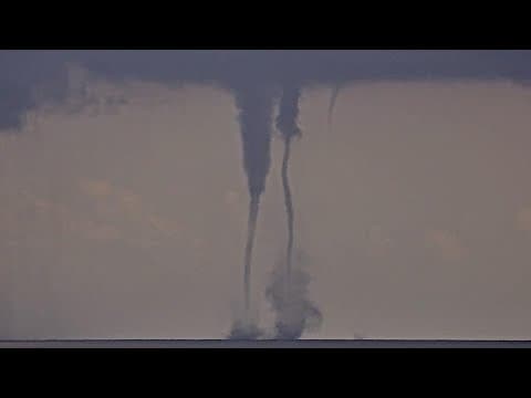 Twin waterspouts captured on camera off the coast of Palm Beach, Florida