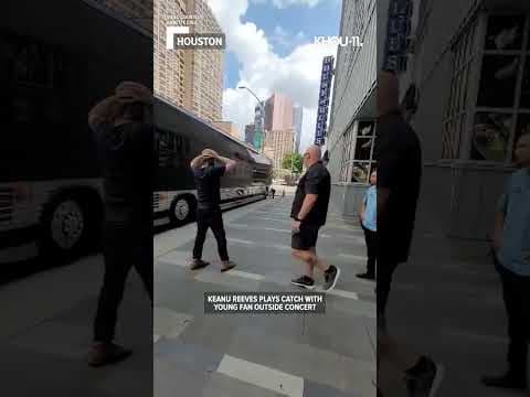 Keanu Reeves tosses a football with a fan outside Houston concert #shorts