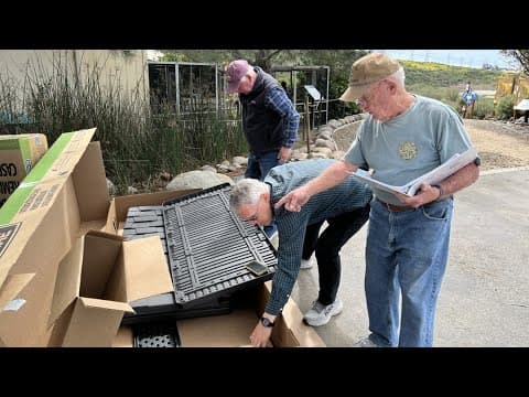Senior volunteers tackle 100-page instruction manual to build shed for 'Raptor Ridge'