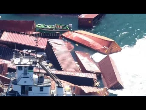 Raw: Dozens of shipping containers tumble into water from cargo ship in California