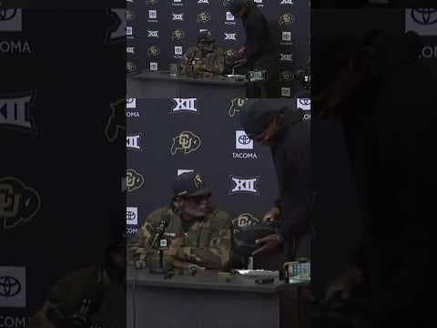 Travis Hunter crashes Deion Sanders news conference after stealing his shoes