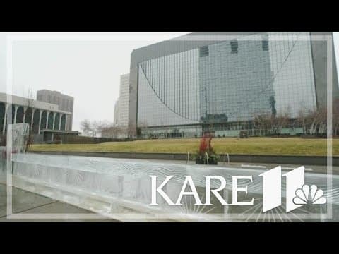 Ice carvers build 100-foot bar, despite warmth