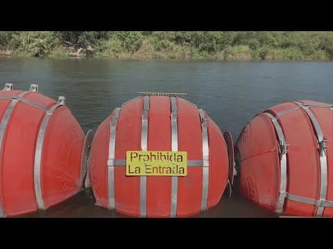 Texas puts more buoys in Rio Grande along Texas-Mexico border after Trumps inauguration.