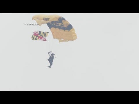 President Trump receives flag from soldier who parachutes onto White House ellipse