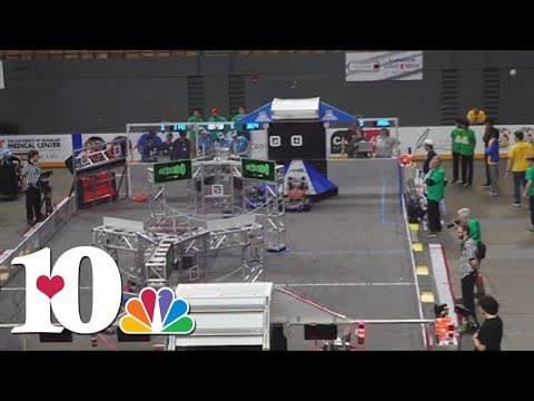 High school students competing in robotics competition