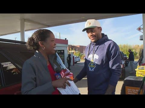 Pacers help give away gas at local Kroger stores