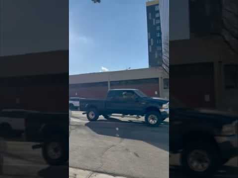 2 arrested after glass thrown at protesters in Denver