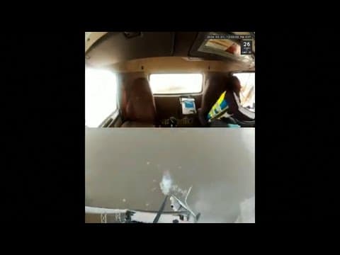 New dash cam footage shows semi-truck driver nearly falling off Louisville bridge