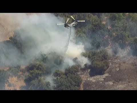 Brush fire burning in Valley Center near Lilac Rd. and Keys Creek Rd.