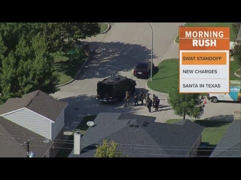 SWAT standoff ends after woman threatened to shoot any officers that entered her home