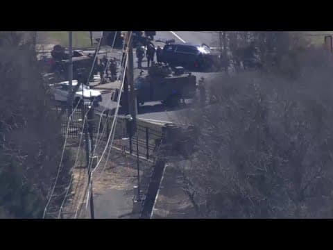 Police standoff with armed man near CIA HQ