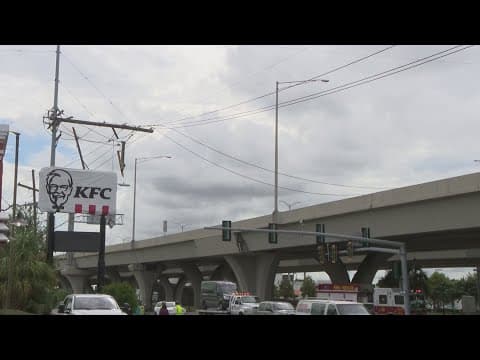 Downed power lines cause traffic jam on Westbank Expressway