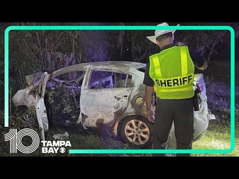 Sheriff: Father tries to save his 2 children from burning car, is only able to rescue son