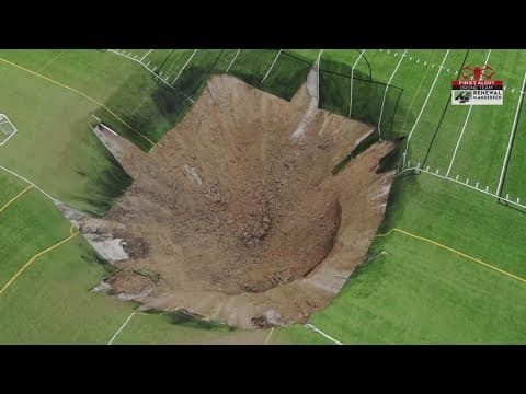 Video shows massive sinkhole open up in the middle of soccer field in Illinois