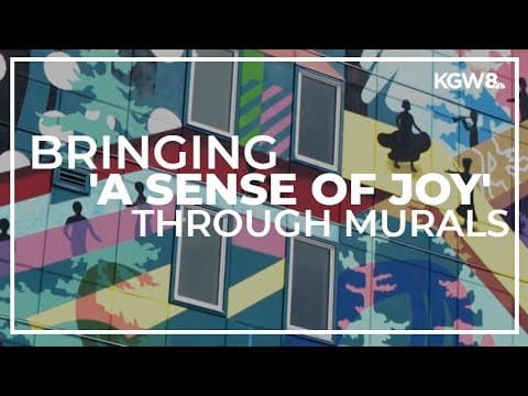 Artists paint colorful mural on Vancouver affordable housing building