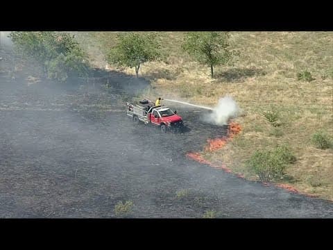 Flower Mound Fire Department working to douse large grass fire