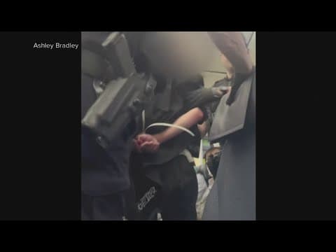 Texas-bound flight diverted after unruly passenger tried to open emergency door