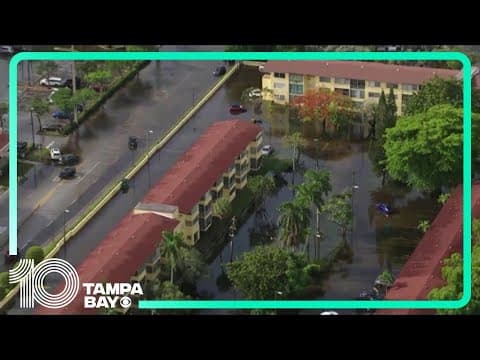 AERIALS: Excessive rainfall floods South Florida homes and airport, strands cars