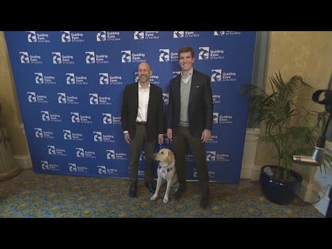 Eli Manning joins handoff of guide dog