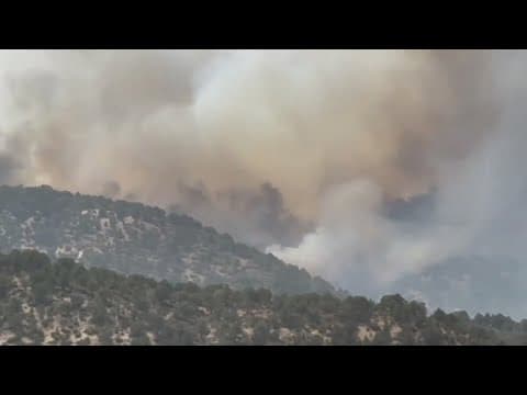 Firefighters working to protect Meeker from 2 wildfires