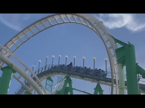 Good call! A man exits a roller coaster after the lap bar unlocks