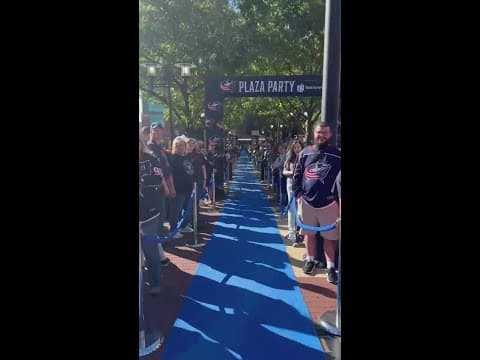 Blue Jackets fans line up on blue carpet