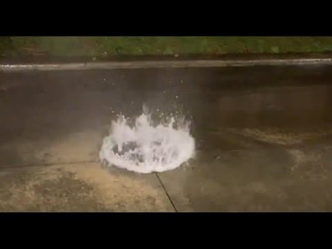 Video shows water overwhelming a manhole cover as Hurricane Beryl moves in