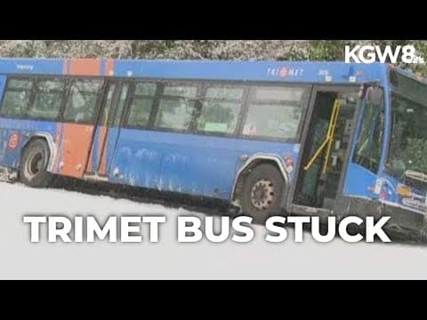 TriMet bus slid off roadway, stuck in Oregon City amid snowy driving conditions