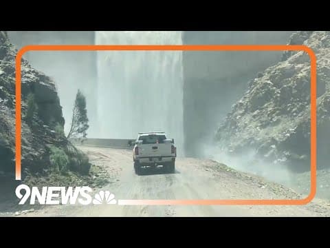 Strontia Springs Reservoir dam spills over into South Platte River in Colorado
