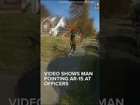 Video shows man pointing AR-15 at police officers