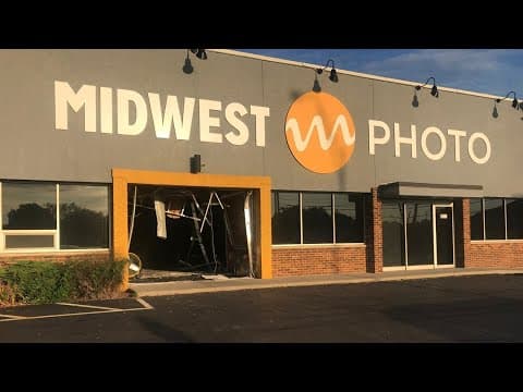 Cleanup underway after stolen utility truck crashed into north Columbus photography store