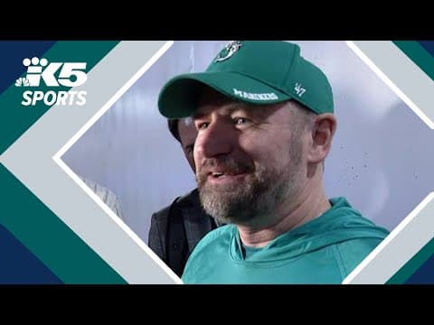 Fan wearing 'Dump 61 Here' shirt catches Cal Raleigh's 61st home run