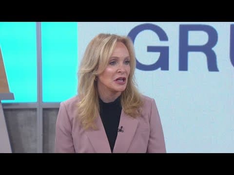 Sandra Maas and her attorney discuss equal pay case