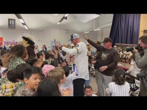 Padres surprise 3rd graders with bicycles at City Heights elementary school