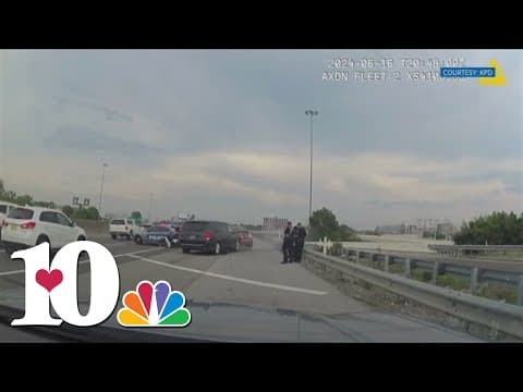 KPD officer walks away uninjured after minivan crashes into parked cruiser on side of highway