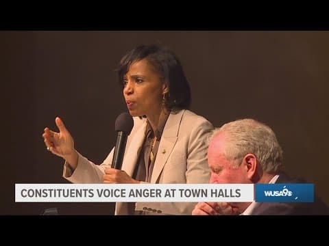Voters erupt in anger at town halls across the country over federal funding cuts, purge