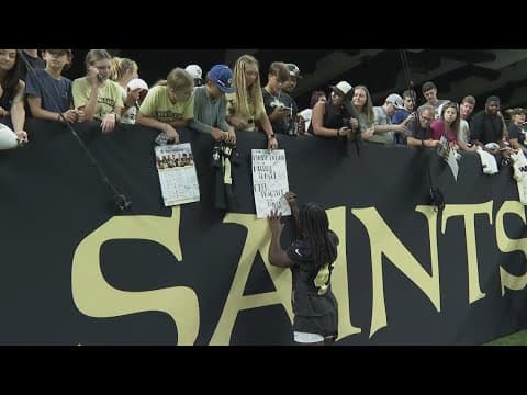 Saints fans attend practice at the Caesars Superdome