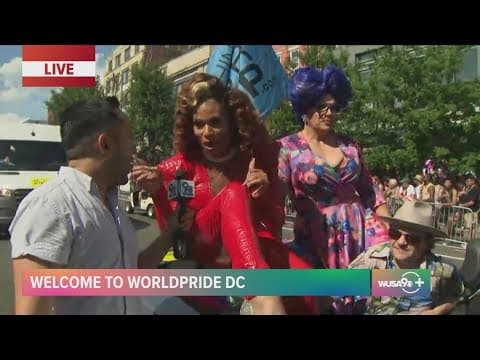 Miss PepperMint and Mrs. Kasha Davis race through DC WorldPride parade route