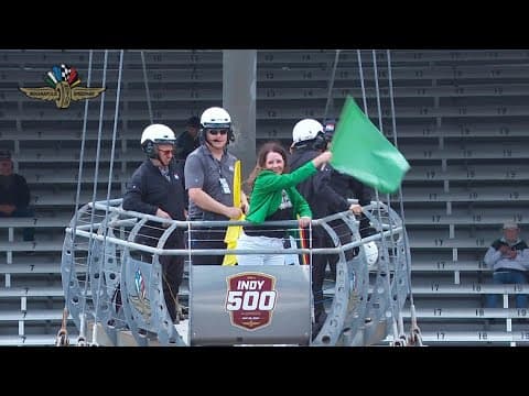 Kelly Greene waves the green flag at Indy 500 practice