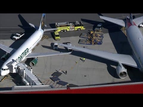 Frontier and American flights clip wings at Boston's Logan International Airport