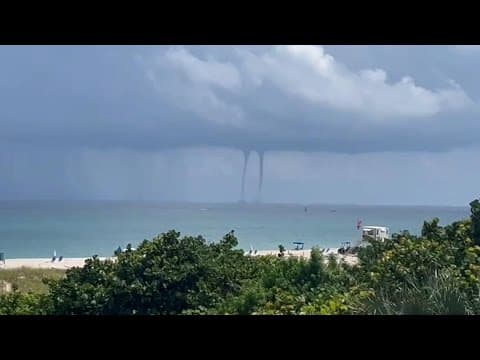 Phone footage captures twin water spouts off the Florida coast