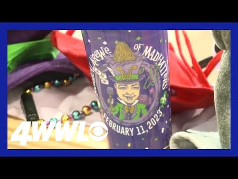 WWLTV krewe in the Krewe of Mad Hatters den, checking out their throws