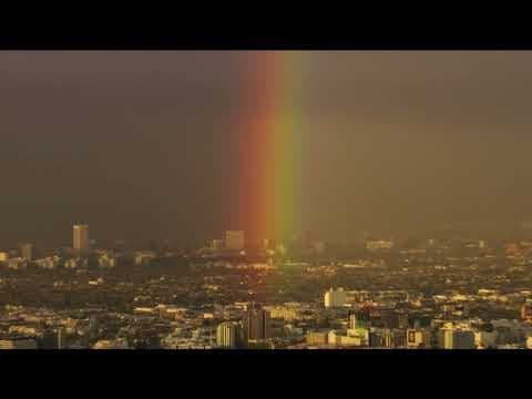 Bright rainbows over Los Angeles skyline