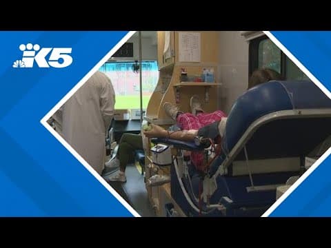 People donate blood at Garfield High School blood drive amid shortage