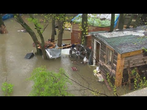 5 people, 2 chickens rescued after encampment floods on Indy's southwest side