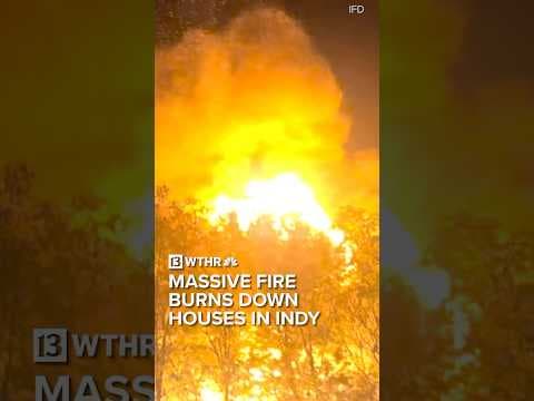 Massive fire burns down houses in Indy