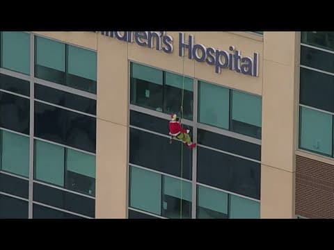 News helicopter captures rappelling Santa