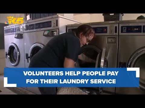 Volunteers lighten the load of the expensive laundromat spin cycle