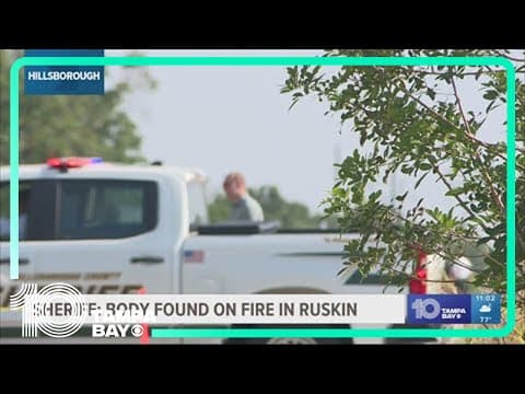 Law enforcement investigate after body found on fire in Ruskin field